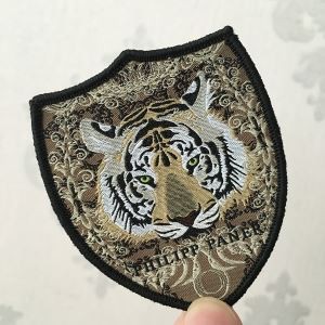 Ħwejjeġ tat-Tiger Garża Badge Badge